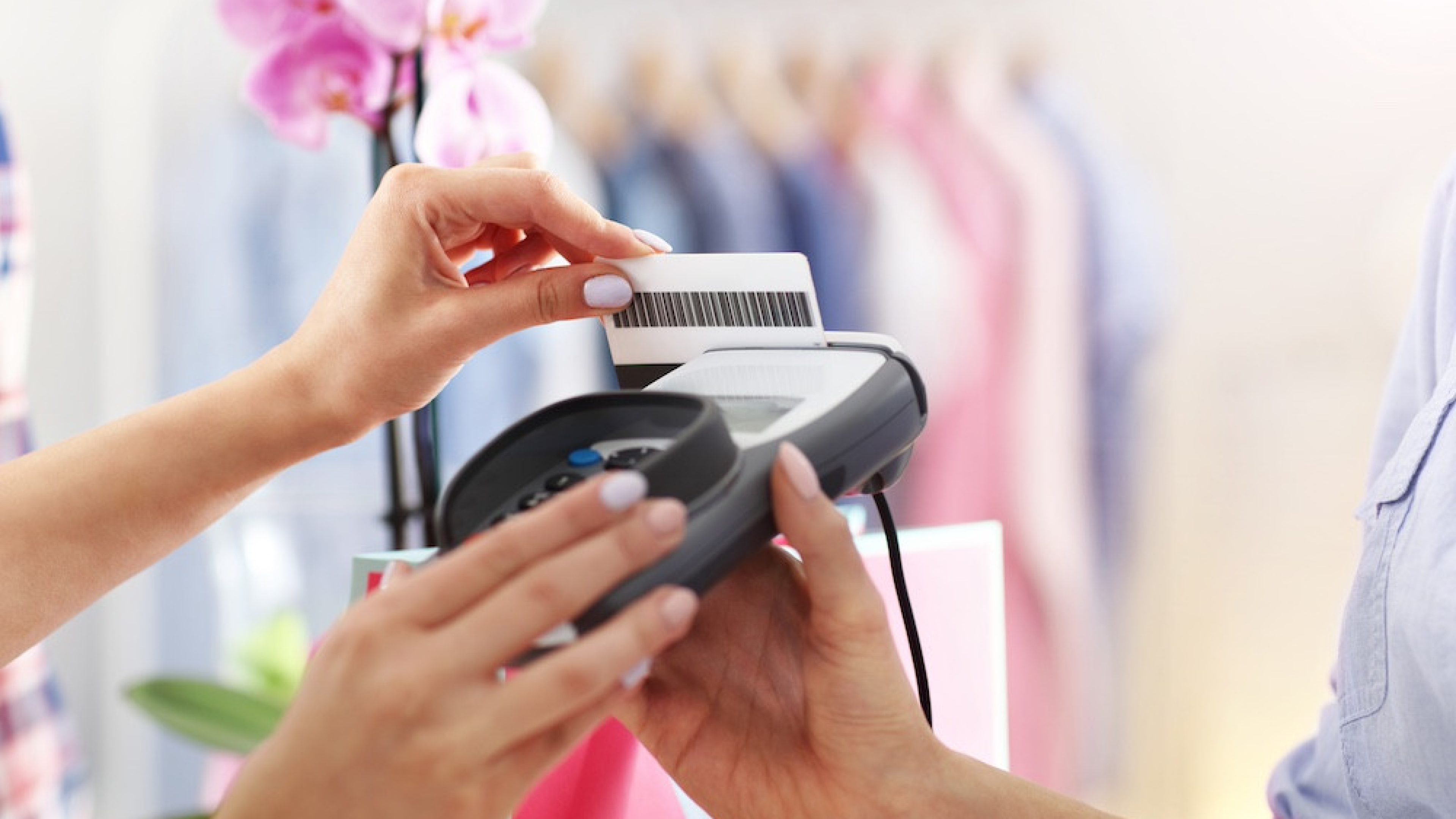 Female customer paying with credit card