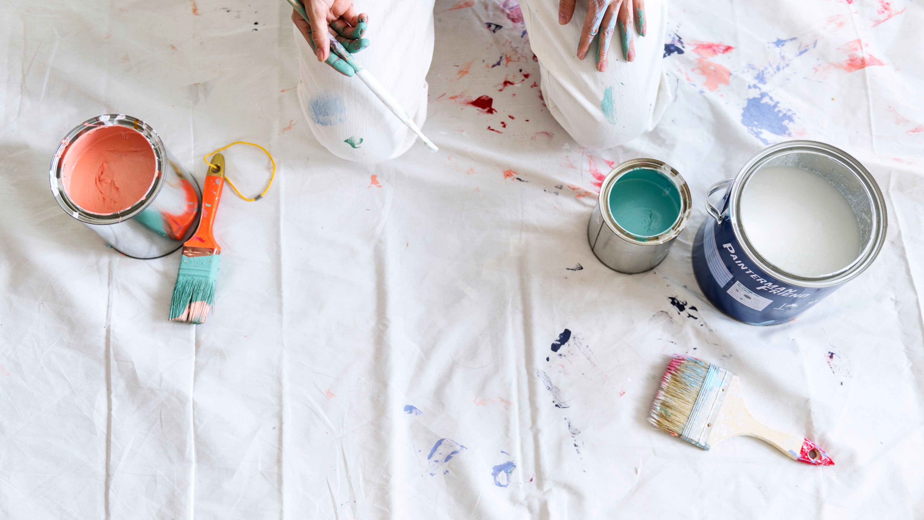 Woman preparing to paint the wall