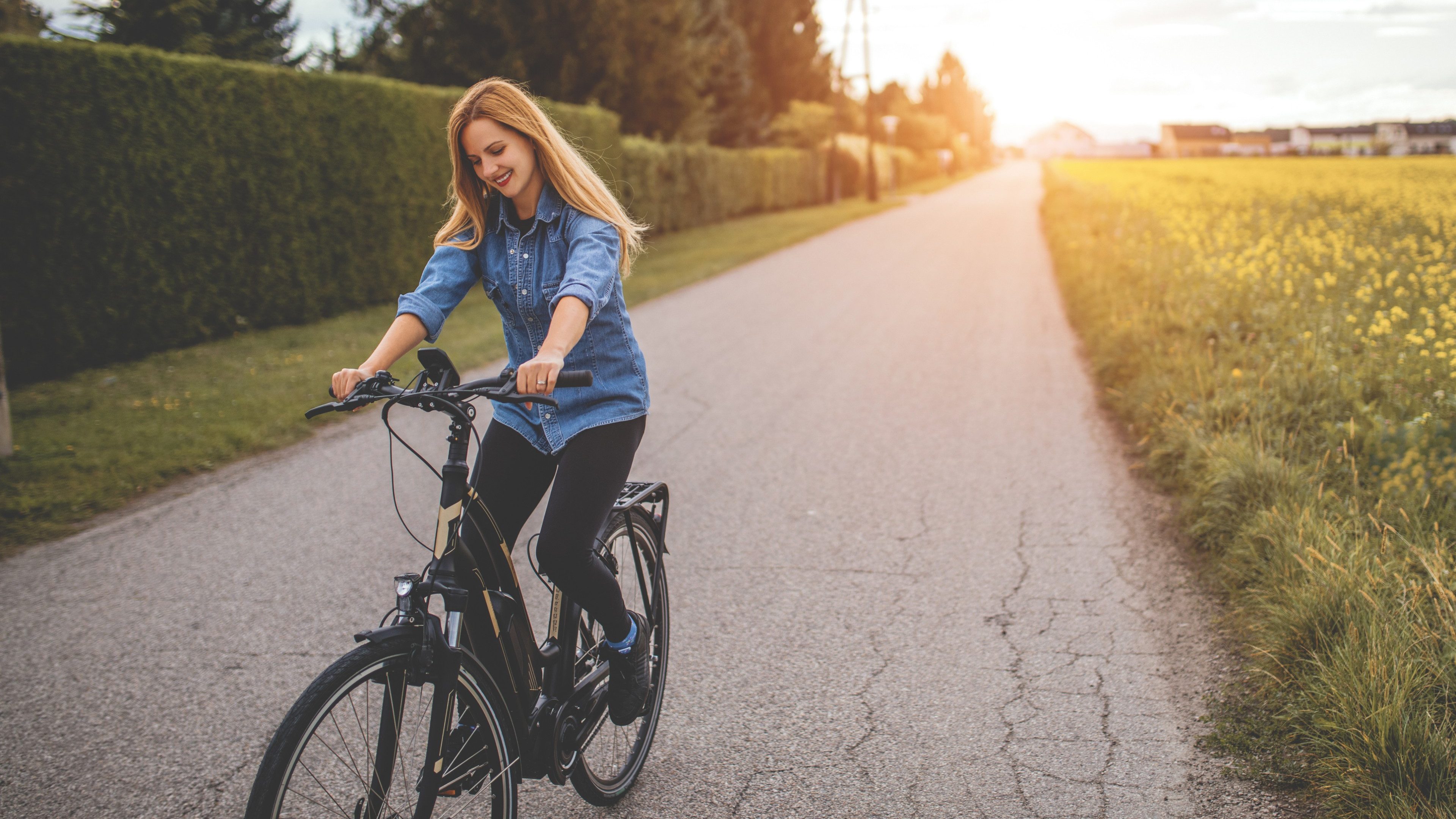 Woman riding on her Electric Bike